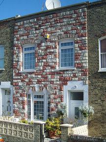 518225-stone-cladding.jpeg.408fe8b6681e37b5e257f20a129f4f6f.jpeg